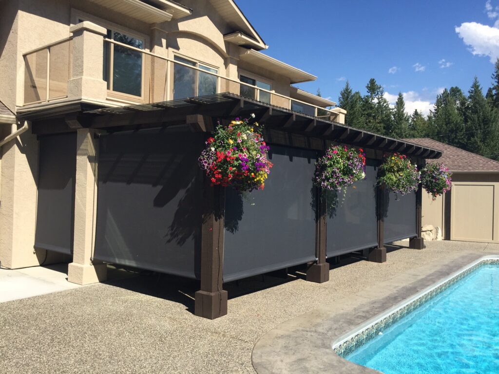 A completely screened-in poolside patio, creating a space for idyllic outdoor comfort.